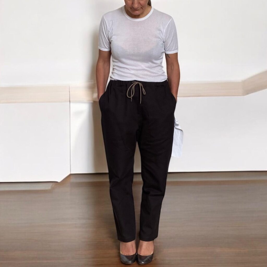 image of The Kei Gardener Wavy Pants by YWGN, tapered line, drawstring at waist, textured fabric in mud colour